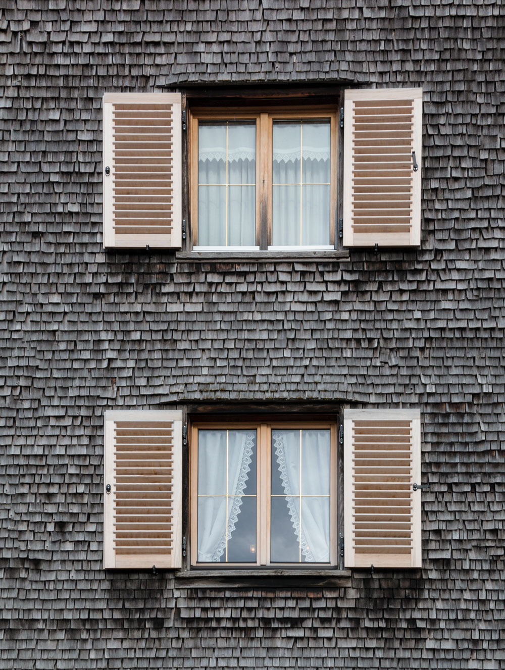 House with wooden shingles in Hittisau, Bregenzerwald in Austria